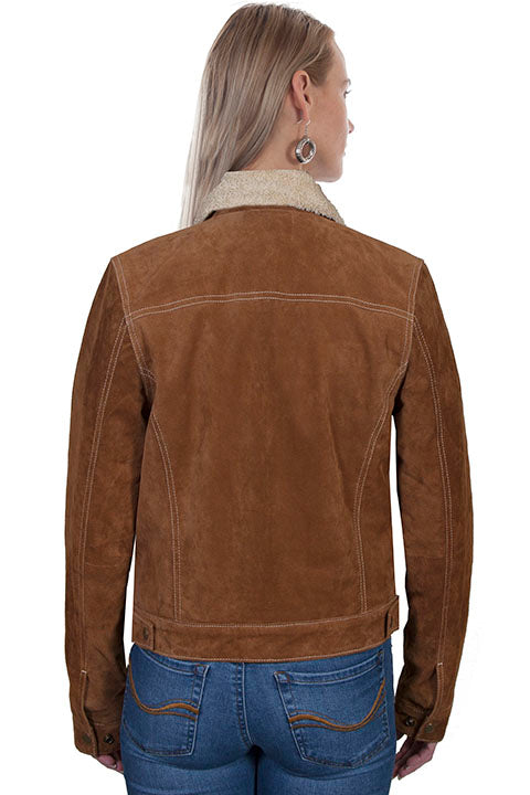 Back view of a woman wearing a brown suede jacket with faux shearling trim.