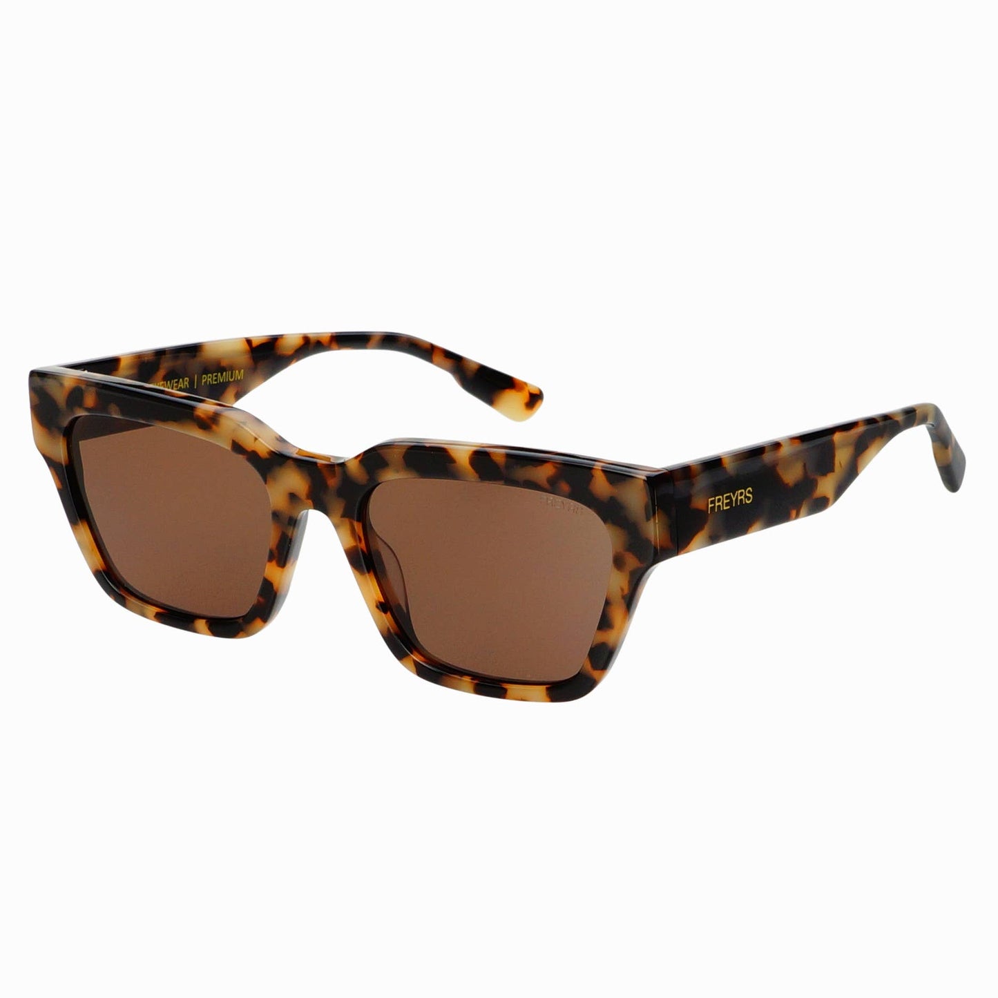 Angled view of Hayden acetate rectangular sunglasses in Milky Tortoise featuring a handmade acetate frame, brown CR39 lenses, and a bold geometric silhouette.