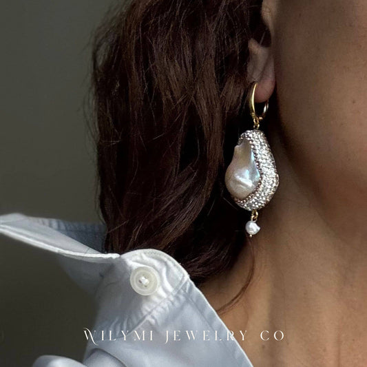 Matching Baroque & Crystal Earrings worn on the ear, showing the pearl and crystal drop design