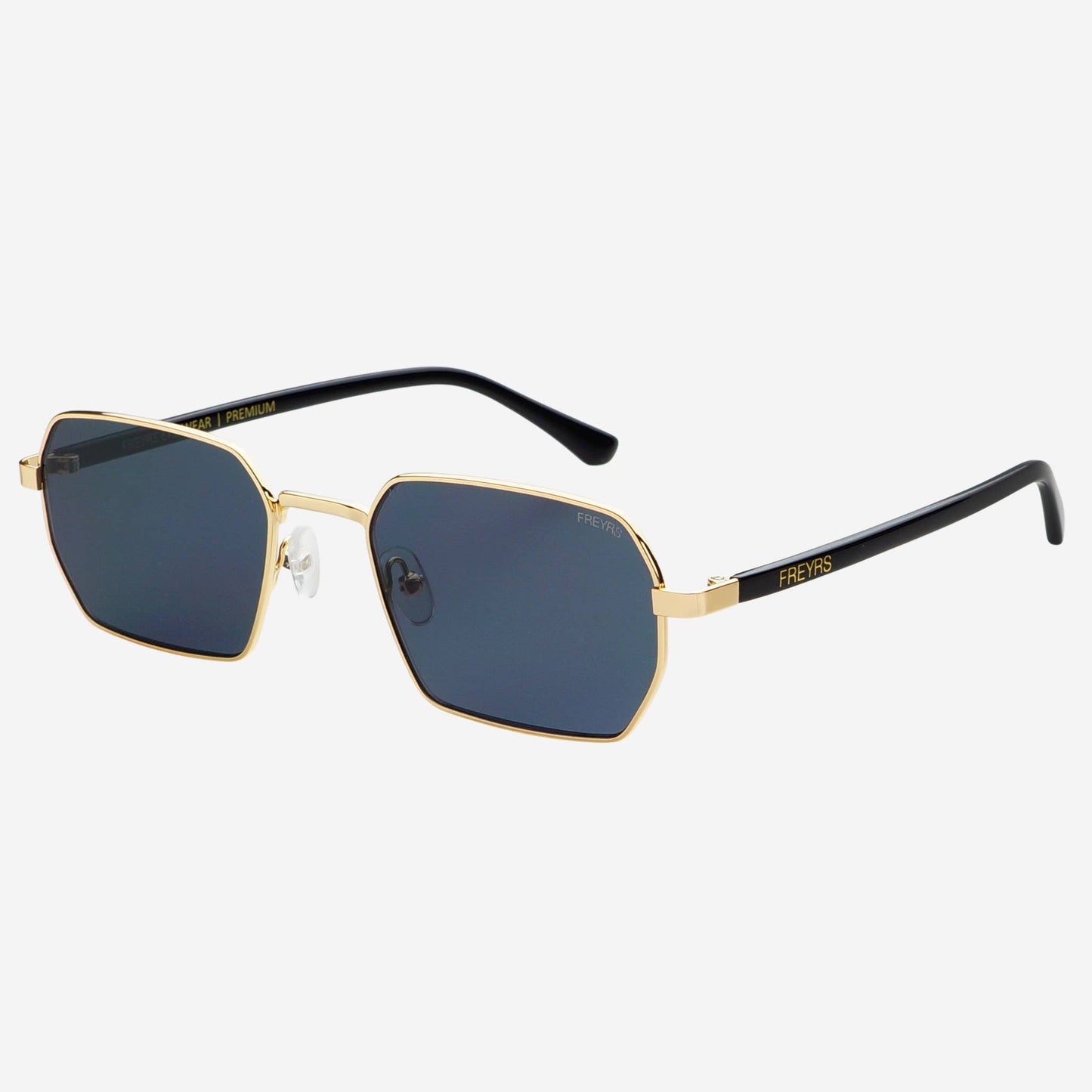 Angled product view of Superior unisex sunglasses featuring a gold stainless steel frame, gray lenses, and black acetate arms.