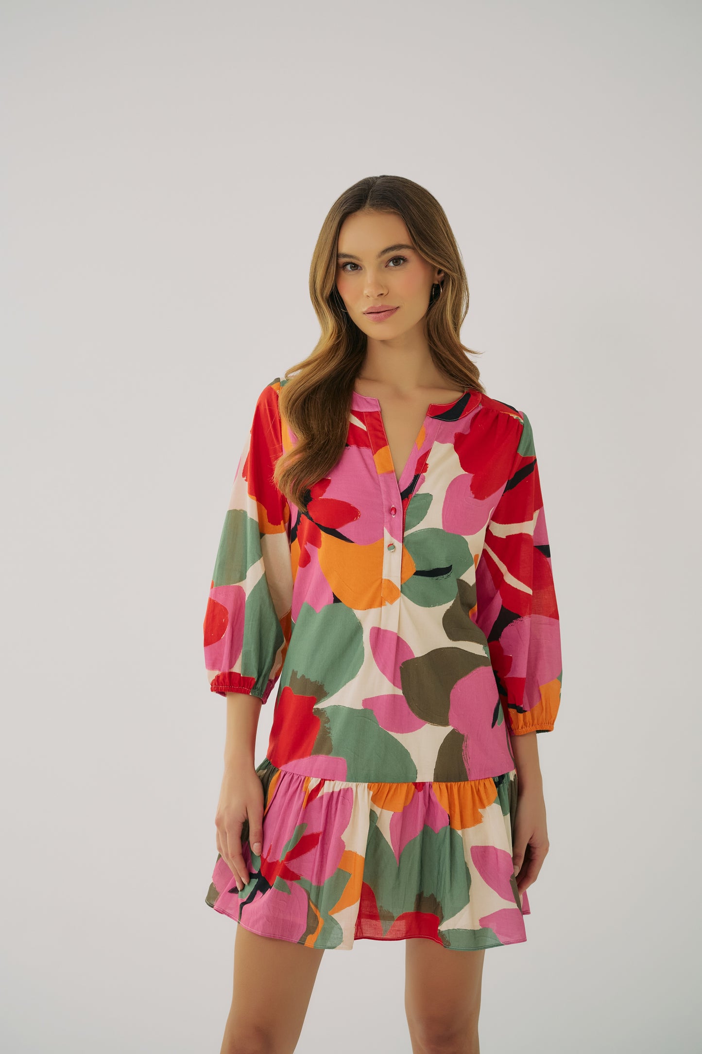 Tamia printed mini dress in ivory multi with long sleeves and ruffled hem, full front view
