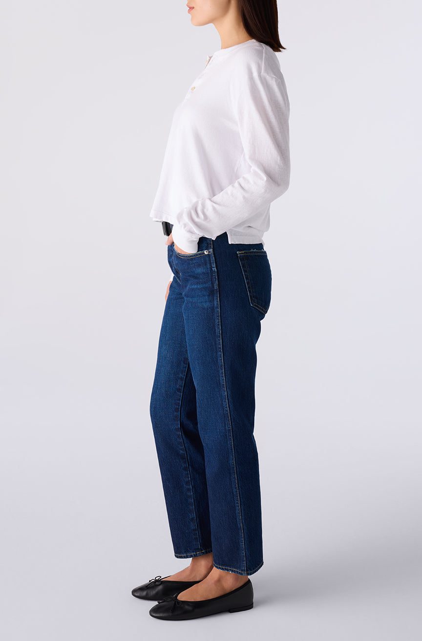 143 Jean in medium blue wash side view with cropped straight leg