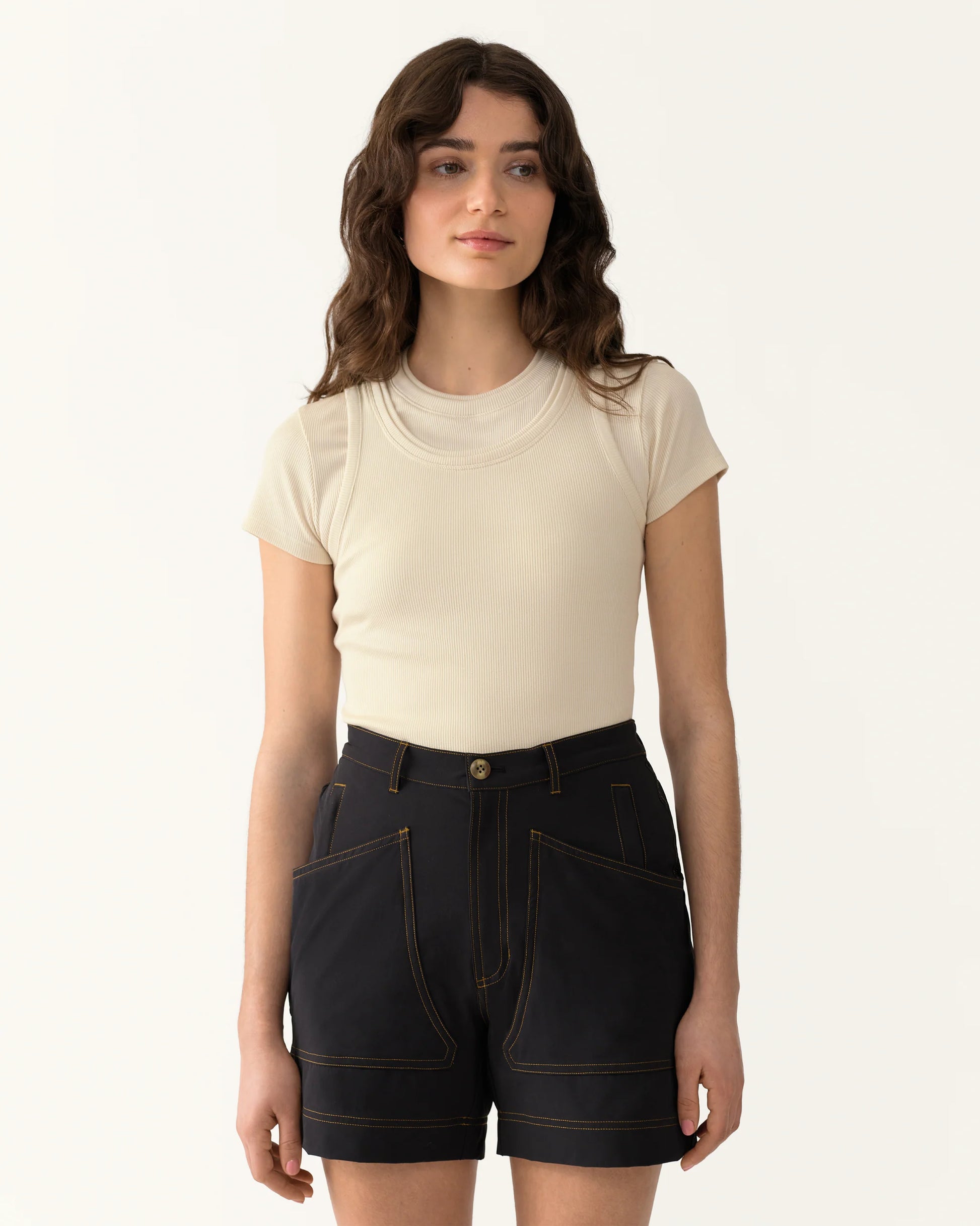Close-up of 8 Pocket Shorts in Basalt showing button closure, belt loops, and front pocket design