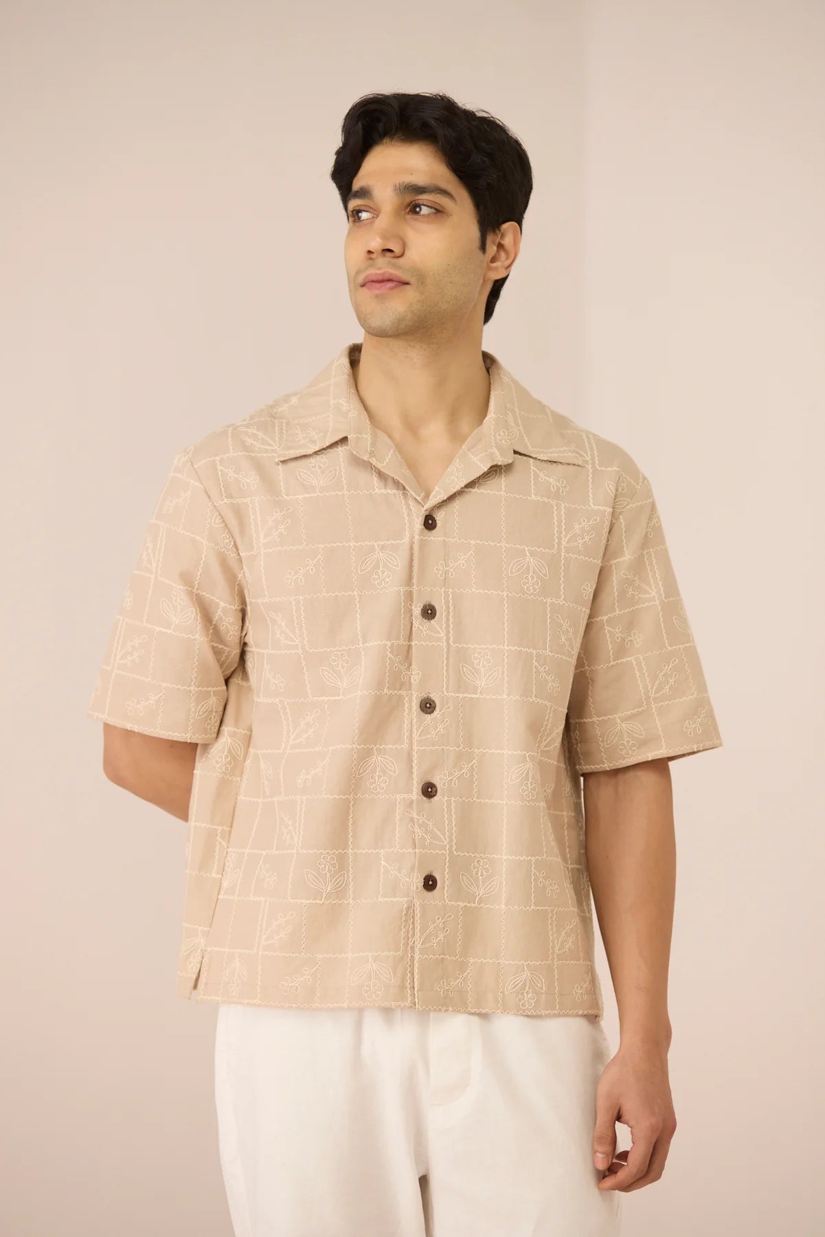 Front detail of the Aiden Shirt, showing the open collar, button-through front, and delicate all-over embroidery.