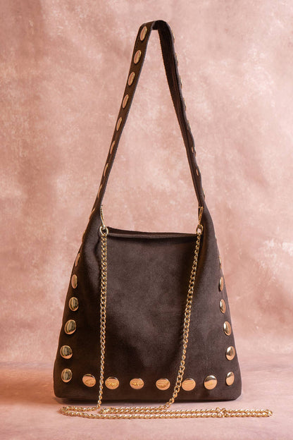 Back view of the chocolate suede Alexane Bag with its removable gold chain strap.