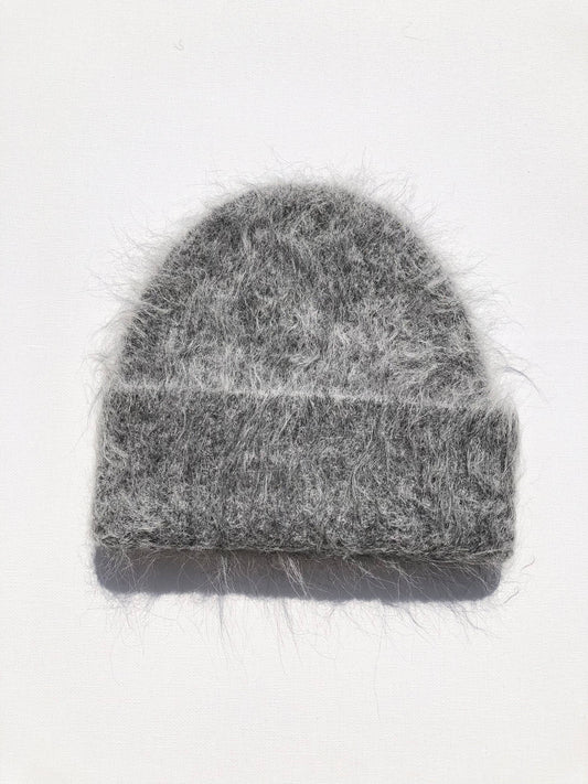Light gray Alpaca Fluffy Beanie with a soft fuzzy texture and folded cuff, photographed on a white background.