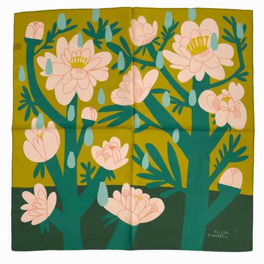 Voyager Silk April Showers silk bandana scarf featuring illustrated pink flowers and blue raindrops on green and earthy yellow tones.