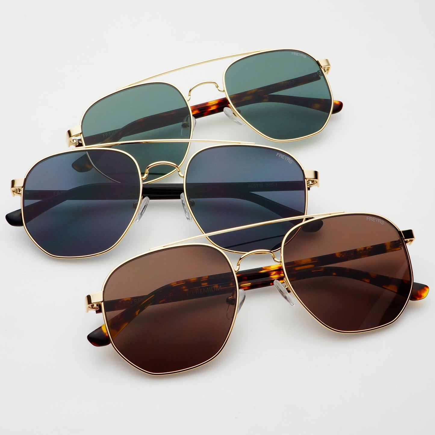 Austin Unisex Sunglasses shown in multiple lens and frame color options.