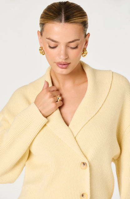 Close-up of the Ayleen Ribbed Wrap Cardigan showing the V-neck wrap neckline, ribbed texture, and soft Butter Yellow color.