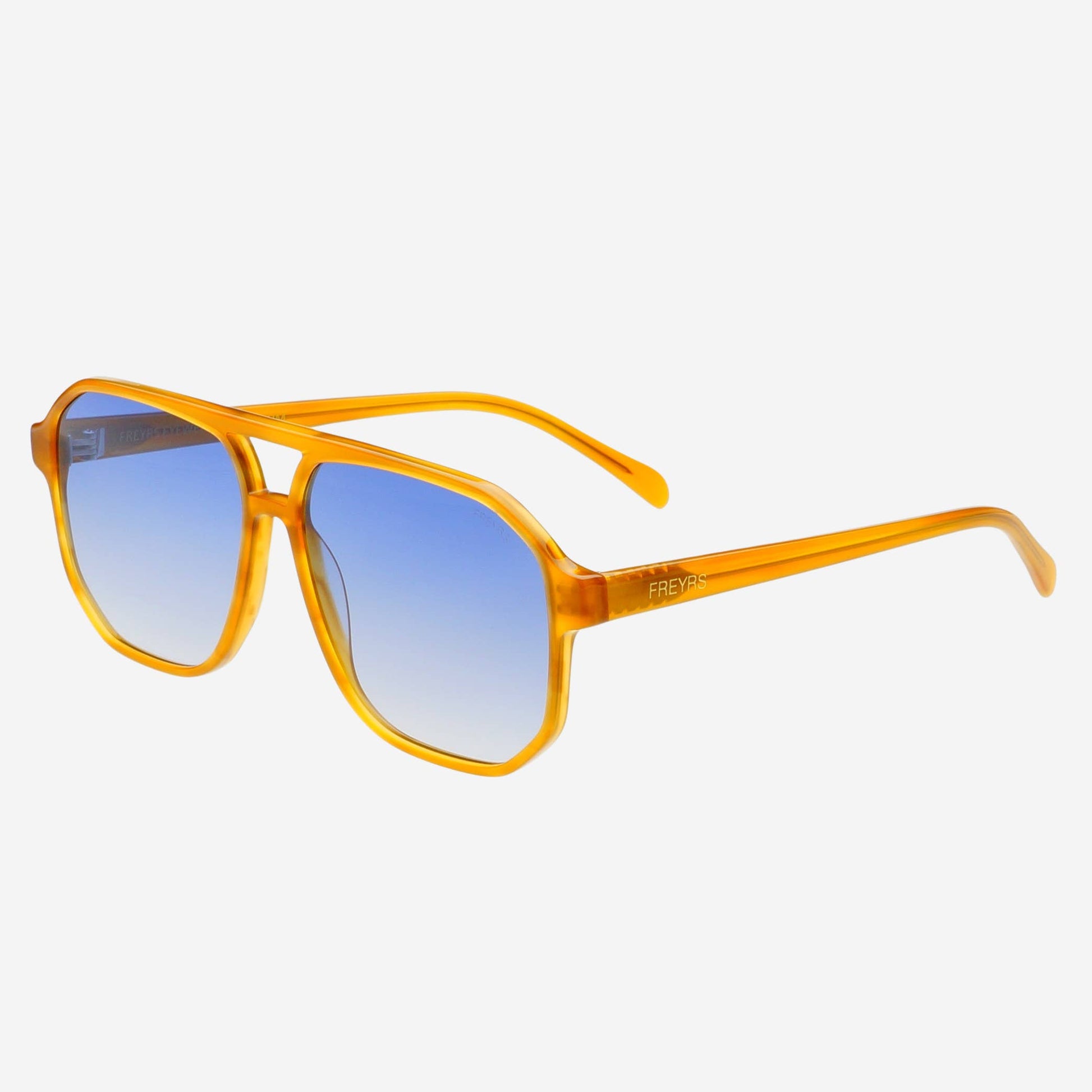 Angled view of Billie Mens Aviator Sunglasses with light brown acetate frames and blue-toned lenses.