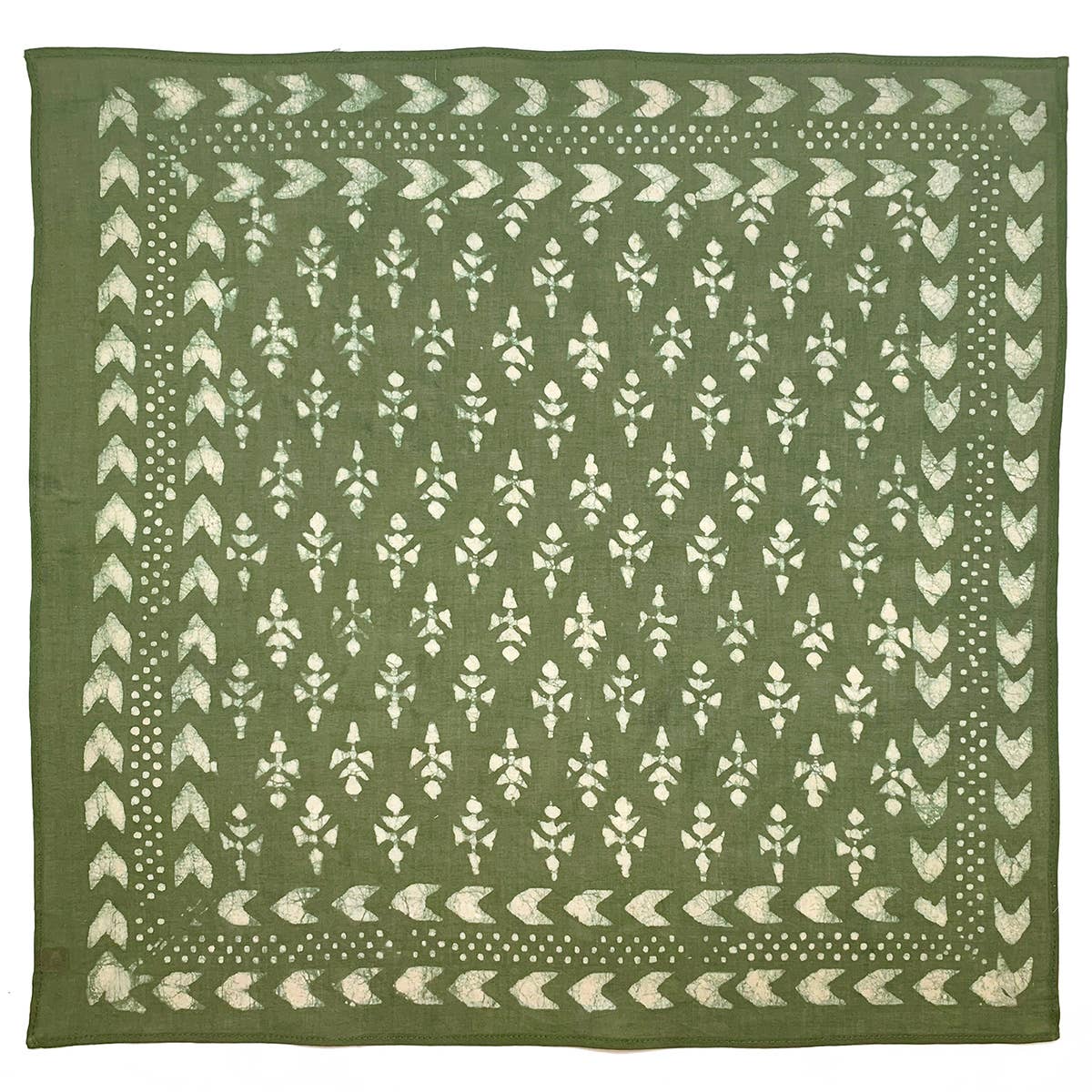 Square green cotton bandana featuring a hand block printed floral motif with an ivory arrow border. Crafted from lightweight, ultra-soft cotton using traditional block printing techniques and eco-friendly dyes.