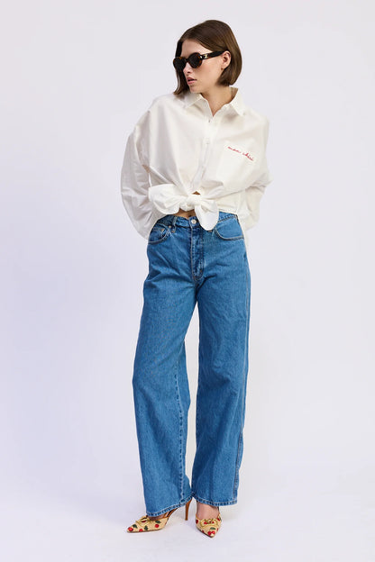 Brittany Oversized Shirt in white styled with wide-leg jeans for a relaxed everyday look