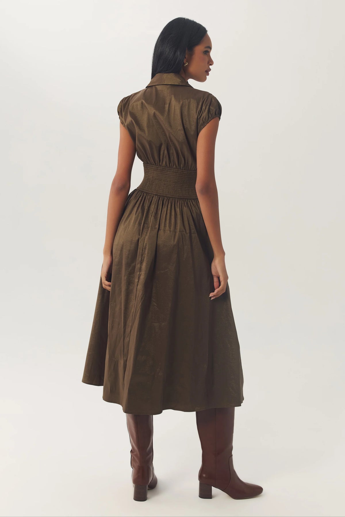 Back view of the Brynny Dress in Olive showing the gathered bodice, defined waist, and full midi-length skirt.