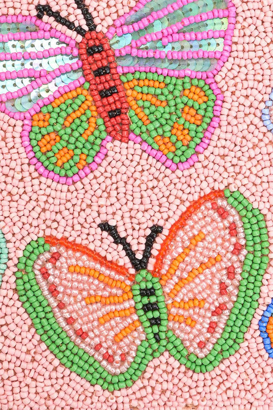 Close-up of the all-over butterfly beaded design on the Butterfly Garden Beaded Shoulder Bag, featuring colorful butterflies on a soft pink beaded background.