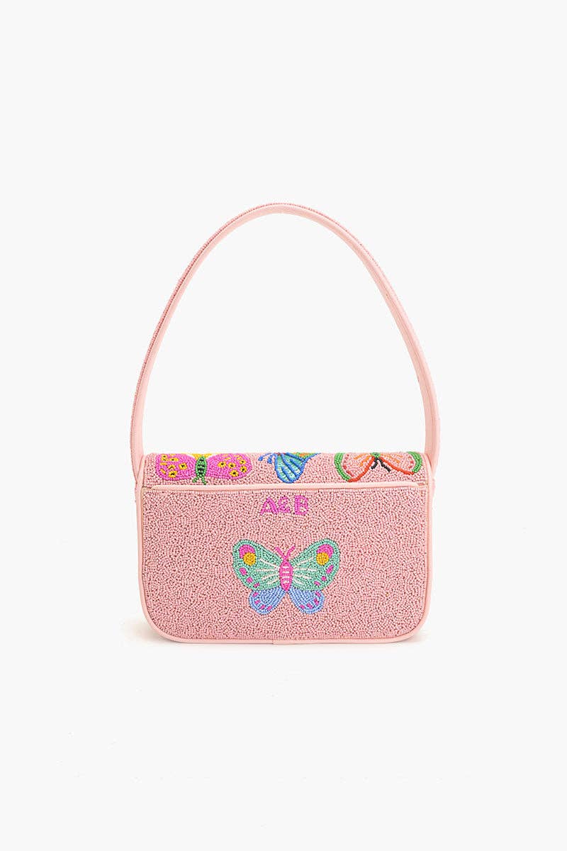 Full front view of the Butterfly Garden Beaded Shoulder Bag with a colorful butterfly design, pink flap closure, and matching shoulder handle.