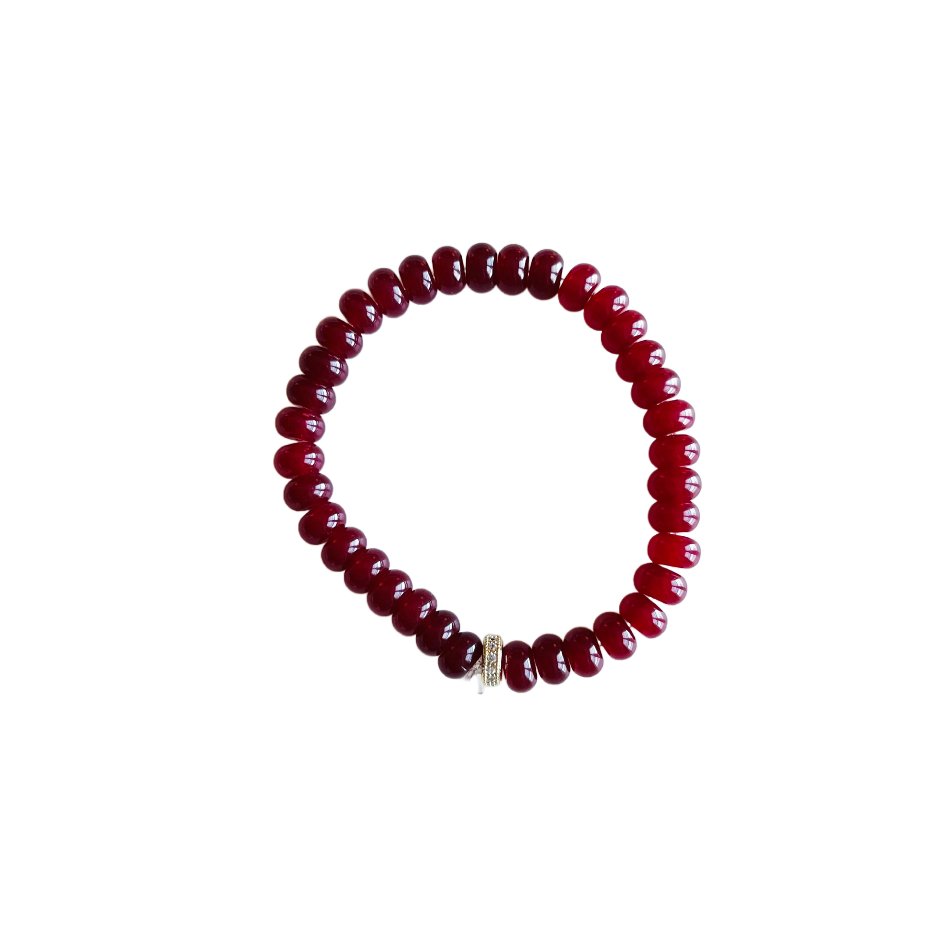 Handmade maroon jade stretch bracelet with glossy gemstone beads and a pave spacer bead on a white background.