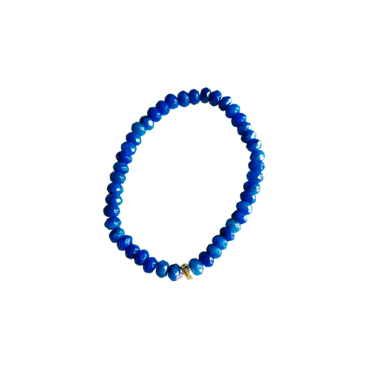 Candy Stretch Bracelet in Malaysia Jade featuring bright blue jade beads and a pavé spacer bead on a white background.
