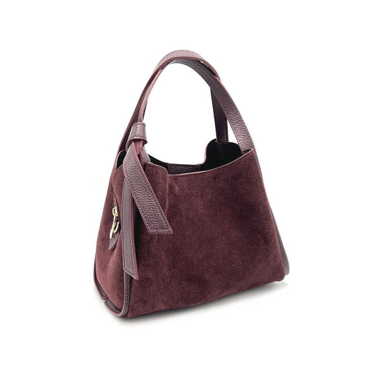 Claire Bordeaux suede handbag with genuine leather trim, dual top handles, and a detachable shoulder strap.