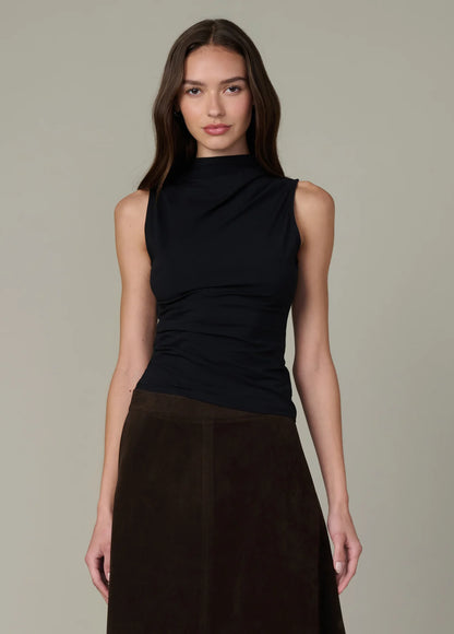 Front view of the black Dove Top featuring a sculpted fit, asymmetric draping, and standing collar.