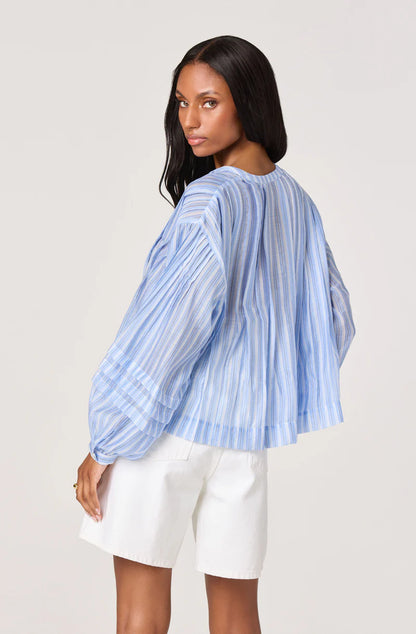 Back view of the Ericka Top in light blue and white stripe featuring a relaxed fit and blouson sleeves