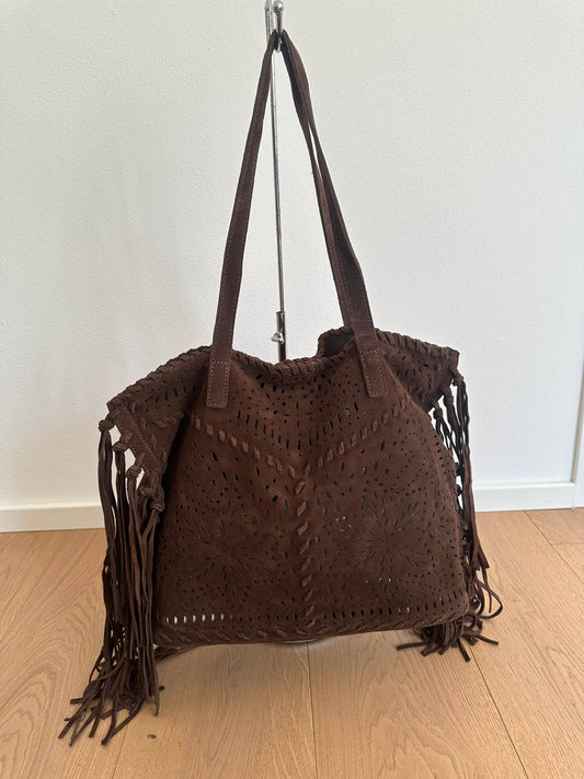 Farah dark brown suede shoulder bag with perforated detailing, long fringe, and double handles, shown from the front.