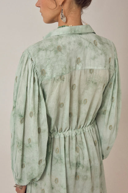 Detailed back view of the Freya Dress in Mineral Waves featuring gathered shoulders, elasticated waistline, and subtle paisley print on cotton voile fabric.