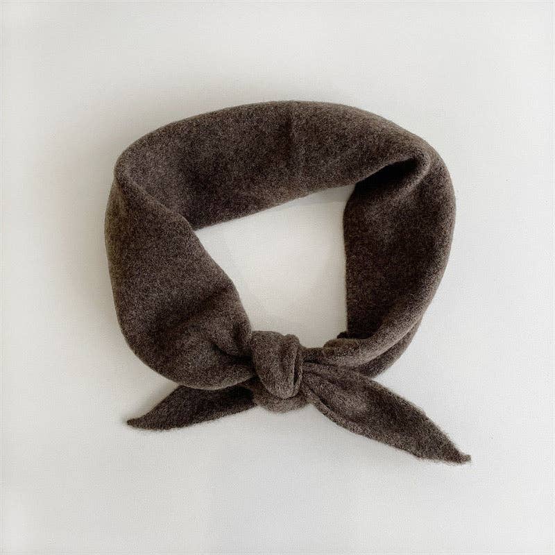 Brown Fuzzy Wool Cravat Scarf tied at the neck on a white background
