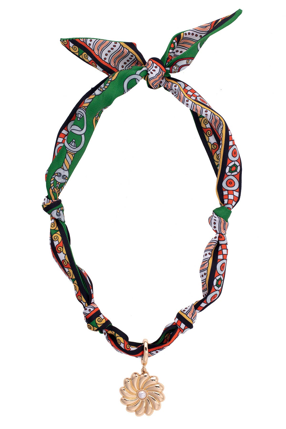 Green, black, and orange printed scarf necklace with gold flower pendant and pearl center detail.