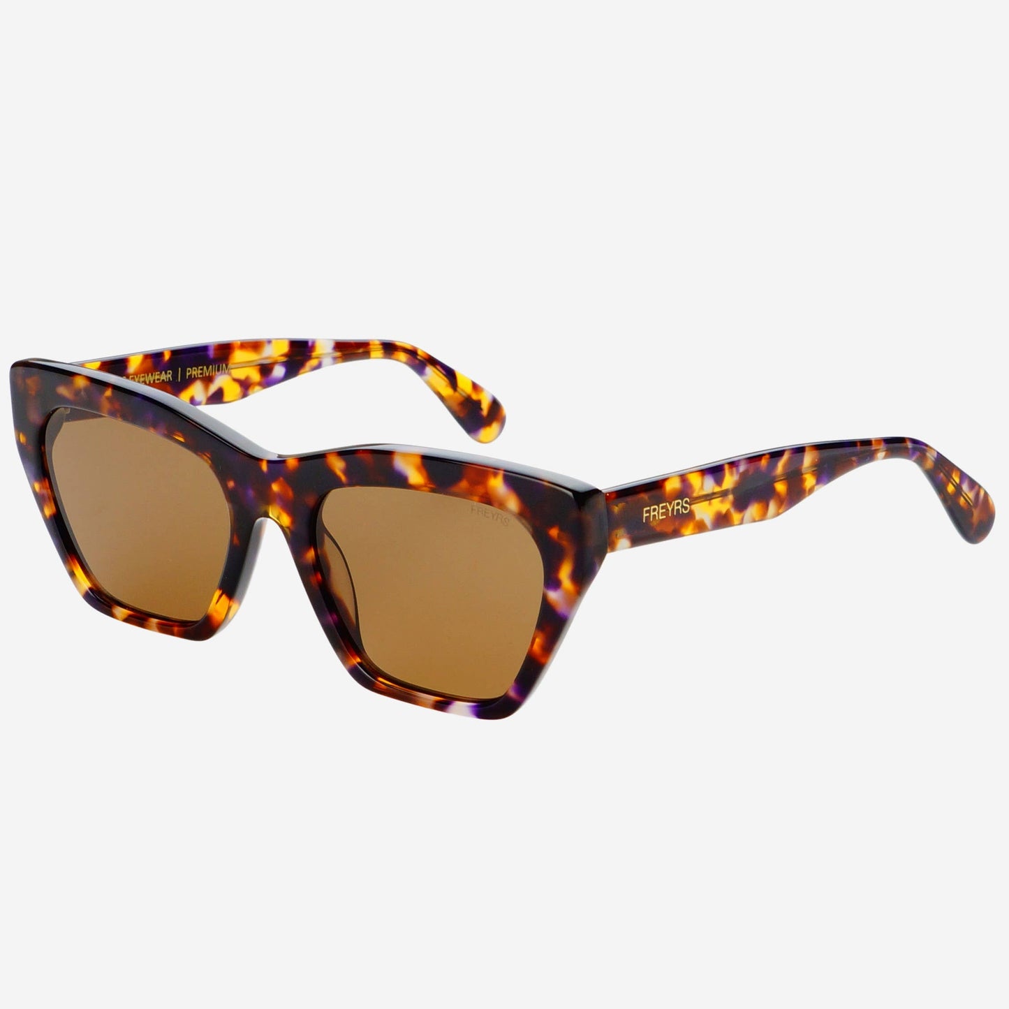 Gia cat-eye sunglasses featuring handmade tortoise acetate frames and brown nylon lenses shown at an angled view.