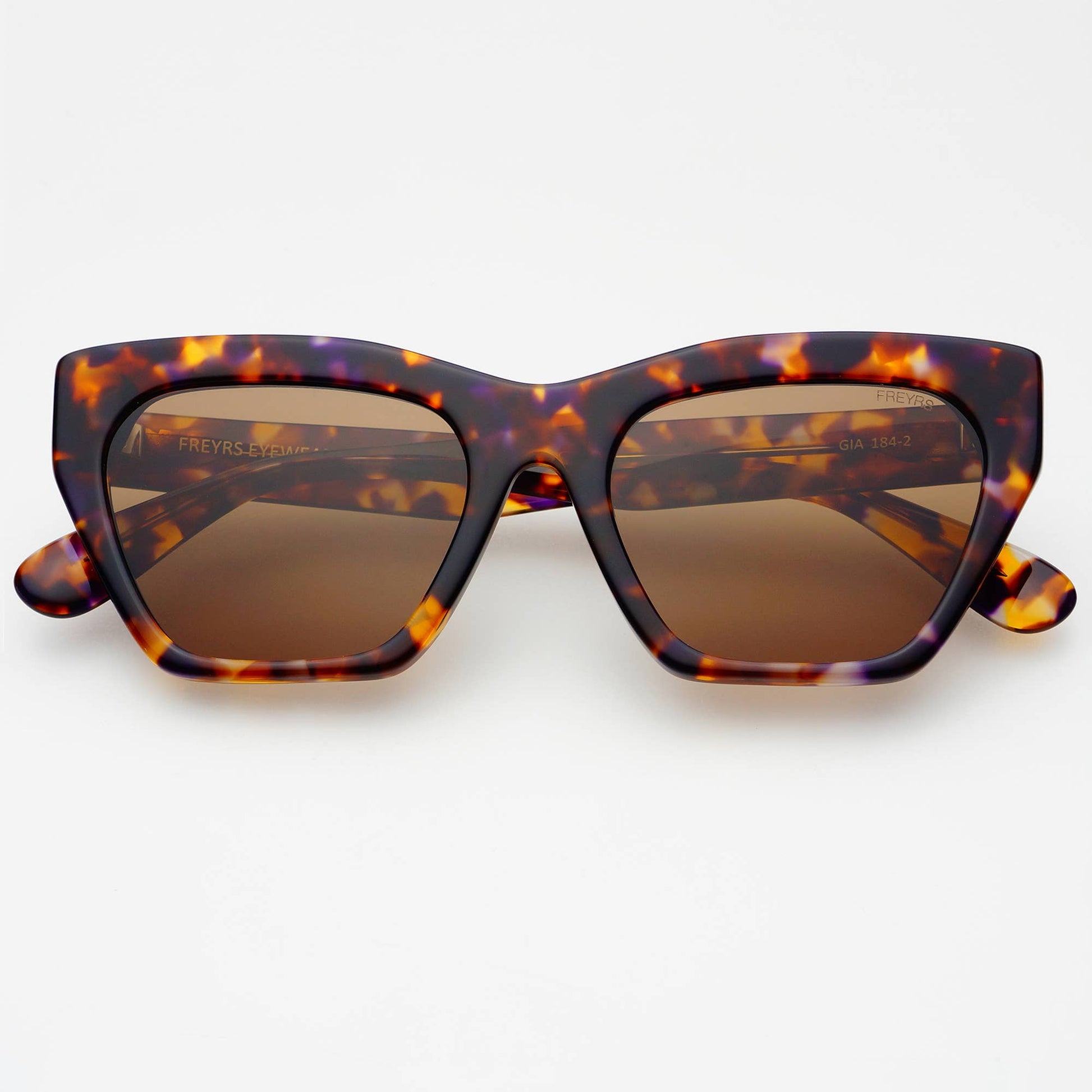 Front view of Gia cat-eye sunglasses in tortoise acetate with brown UV-protective lenses.