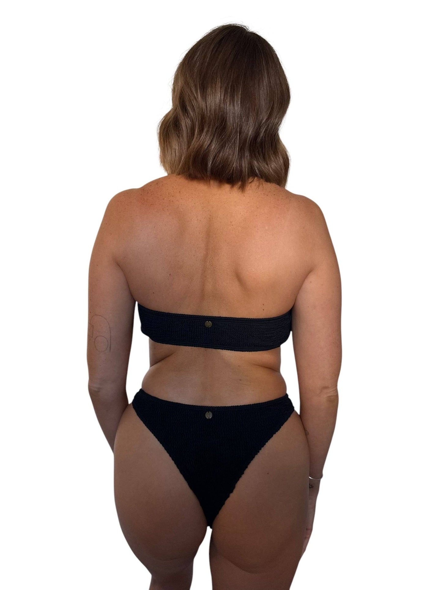 Back view of the Grayce Bottom in Midnight, showing the ribbed fabric and cheeky bottom coverage.