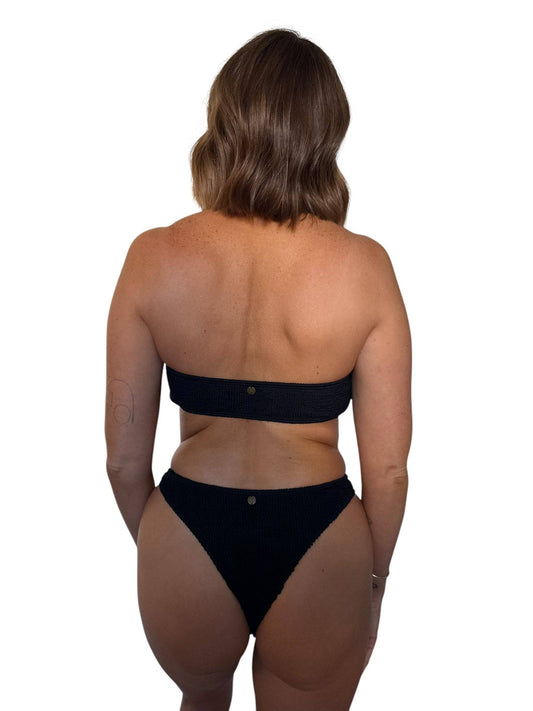 Back view of the Grayce Bottom in Midnight, showing the ribbed fabric and cheeky bottom coverage.