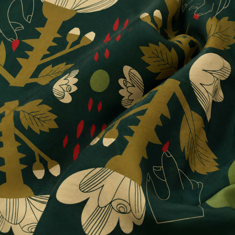 Close-up of the Green Rose and Thorn silk scarf showing the smooth Habotai silk texture and illustrated floral artwork.