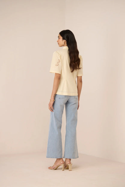 Full back view of the Hartley Shirt in cream cotton poplin with a relaxed fit and classic short sleeve shape.