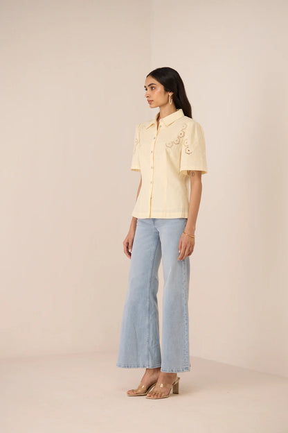 Side view of the Hartley Shirt styled with light blue jeans for an elevated everyday look.