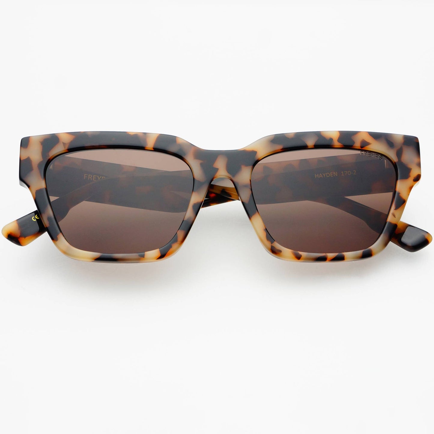 Front view of Hayden acetate rectangular sunglasses in Milky Tortoise with brown CR39 lenses, featuring a bold angular frame and medium-fit design.