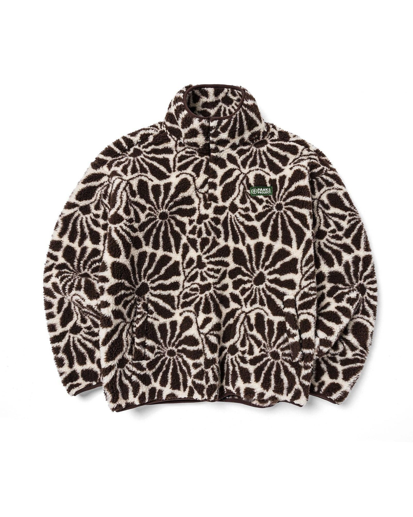 Front view of the brown and natural High Desert Wildflowers high-pile fleece with an allover floral print, high collar, snap placket, front pockets, elastic cuffs, and gathered hem.