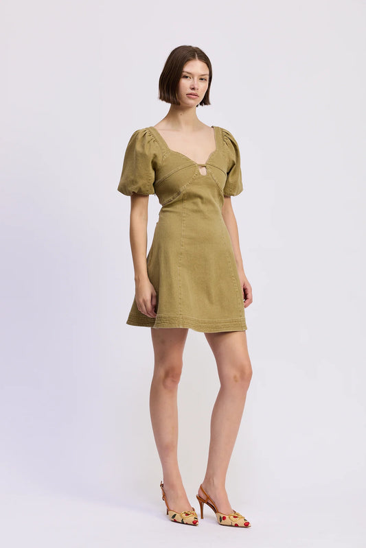 Angled front view of the Isabelle Mini Dress in olive green with puff sleeves, structured fitted bodice, sweetheart neckline, and A-line mini silhouette.