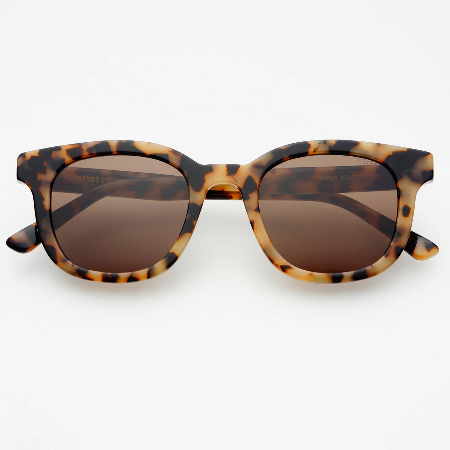 Front view of Jasper acetate sunglasses featuring a tortoise frame and brown lenses.