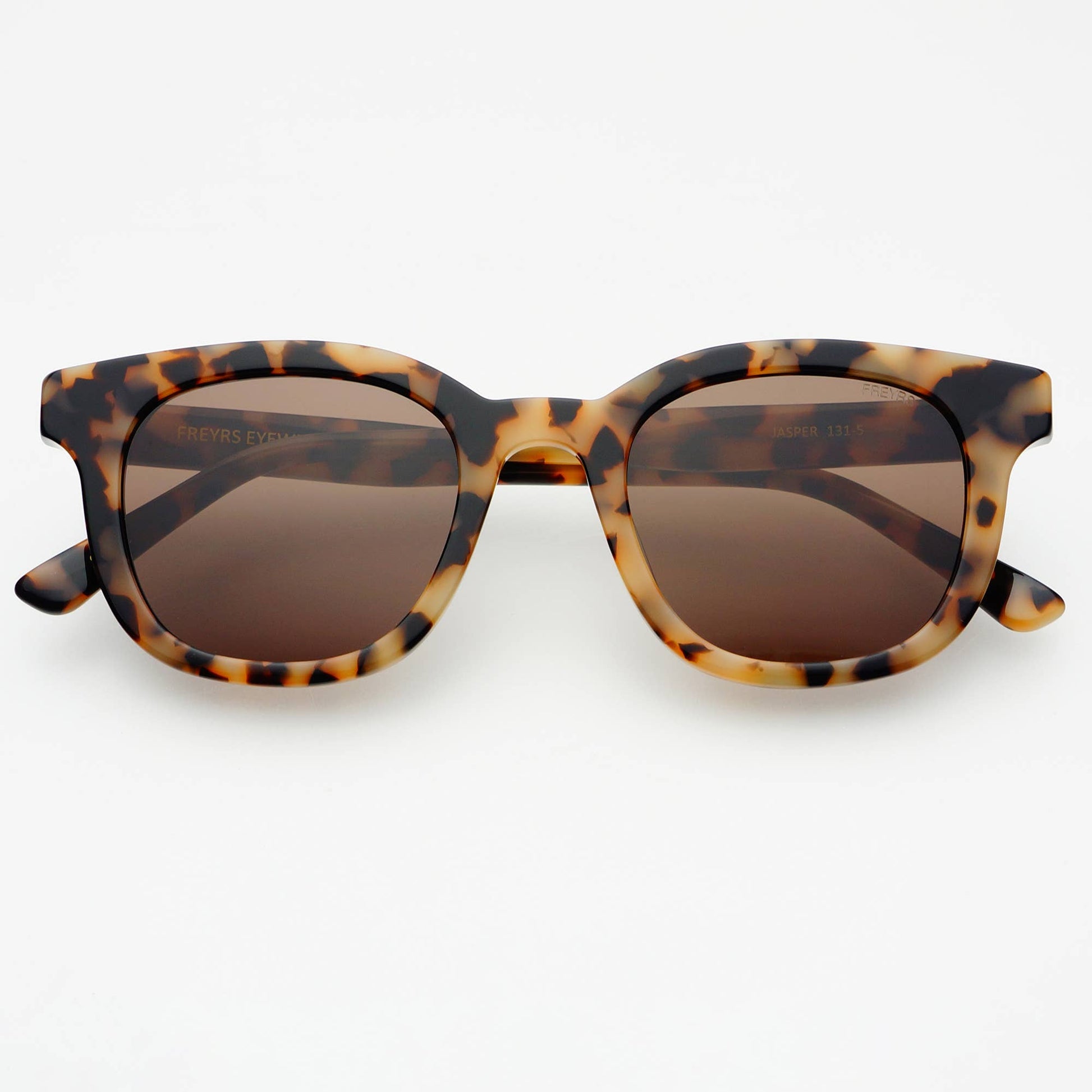 Front view of Jasper acetate sunglasses featuring a tortoise frame and brown lenses.