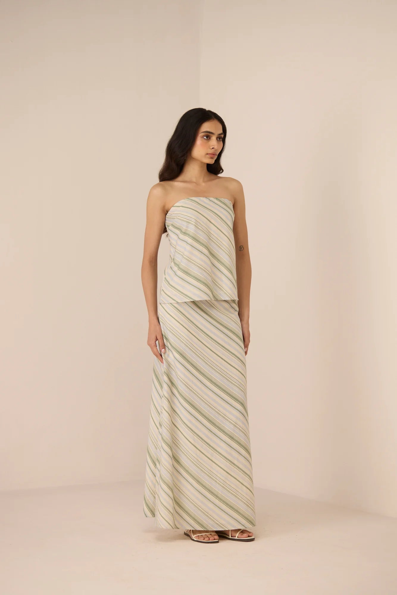 Angled front view of the Josie Skirt in Shoreline featuring a soft diagonal striped print.
