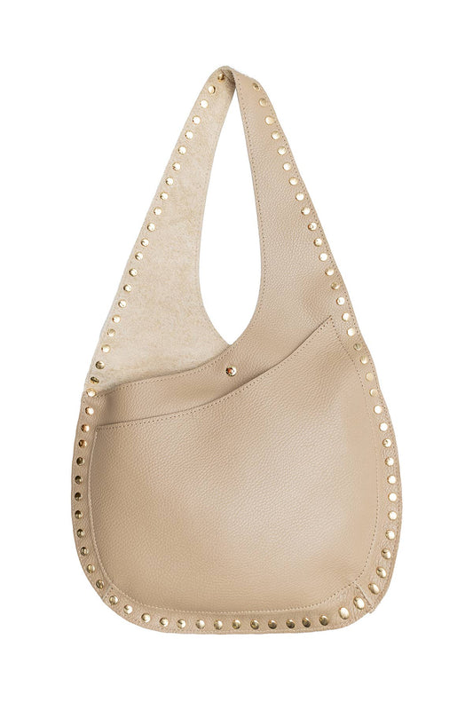 Taupe KARINE shoulder bag in grained cowhide leather with studded trim, front pocket, and slouchy silhouette.