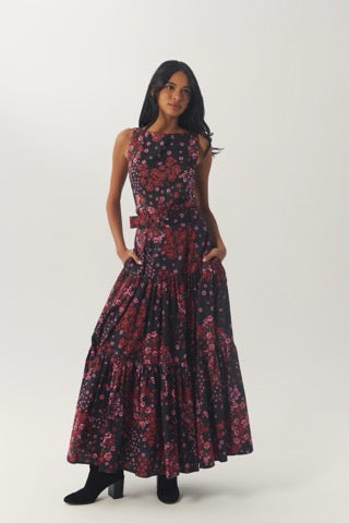 Model wearing the Kady Top in Black/Rose with the coordinating floral maxi skirt and black boots.