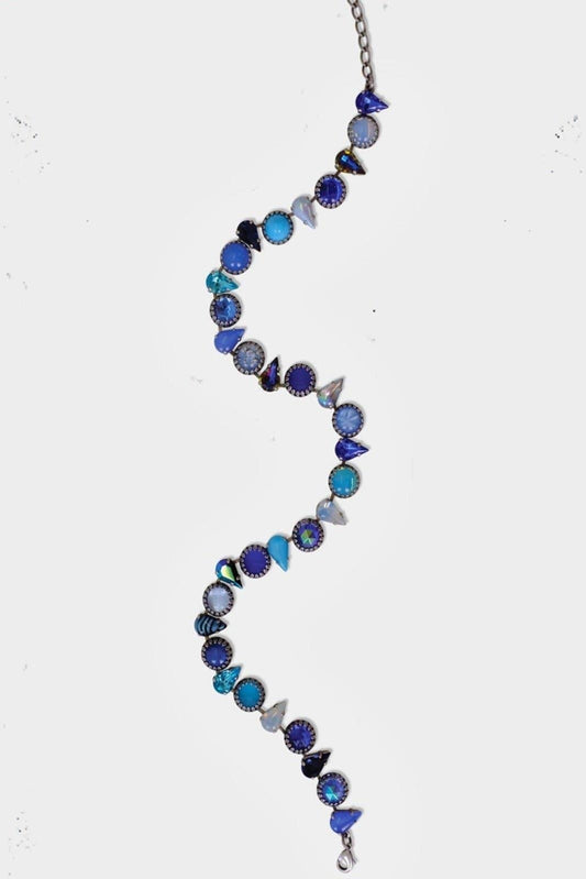 Layering Choker in Ocean Silver featuring alternating round and fang-shaped blue vintage glass stones.