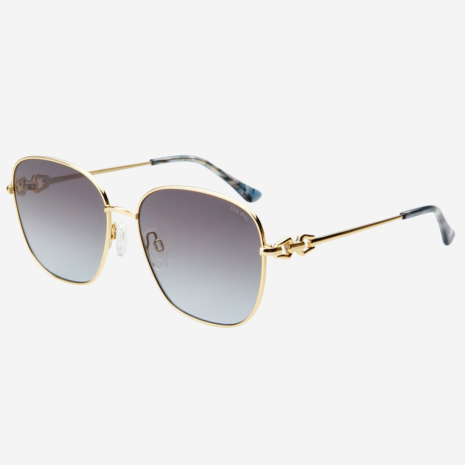 Lea women's round sunglasses featuring a gold-tone stainless steel frame, gradient gray CR39 lenses, and acetate temple tips shown from an angled side view.
