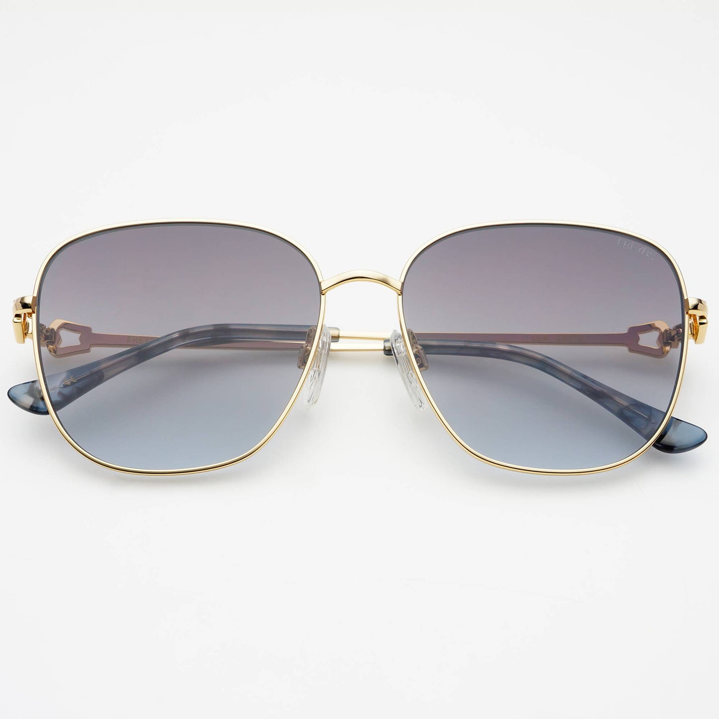 Front view of Lea women's round sunglasses featuring a gold-tone stainless steel frame, gradient gray lenses, adjustable nose pads, and acetate temple tips.