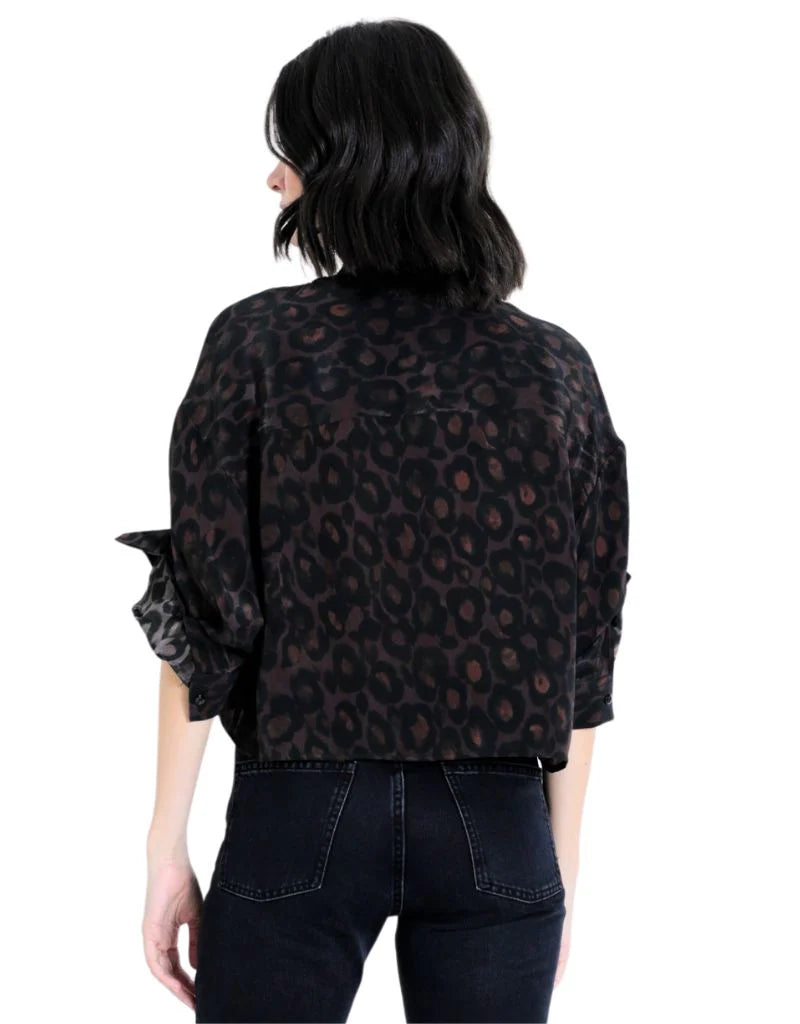 Back view of the Malaga Print Shirt featuring an all-over black and brown leopard print with a relaxed cropped silhouette.
