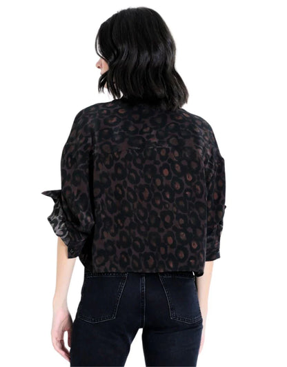 Back view of the Malaga Print Shirt featuring an all-over black and brown leopard print with a relaxed cropped silhouette.