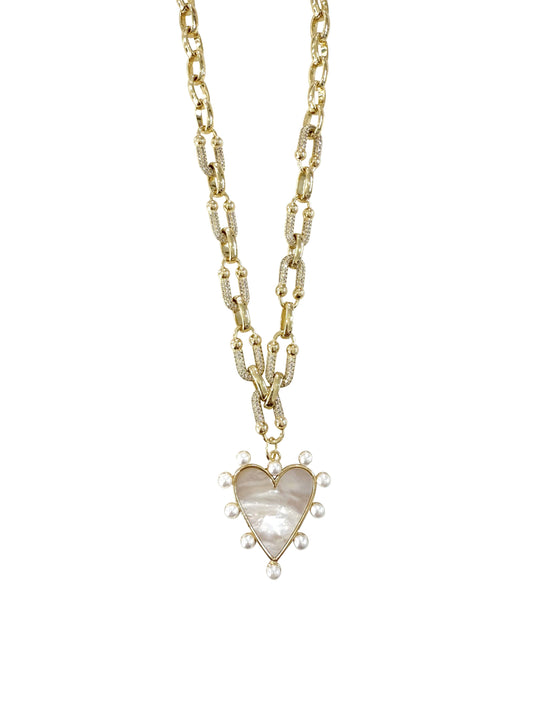Gold link necklace with CZ accents and a pearl heart charm on a white background.