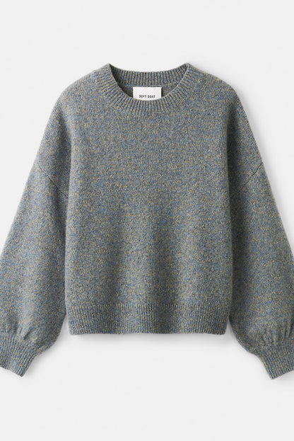 Blue-grey marled crewneck sweater laid flat, showing its relaxed shape and ribbed trims.